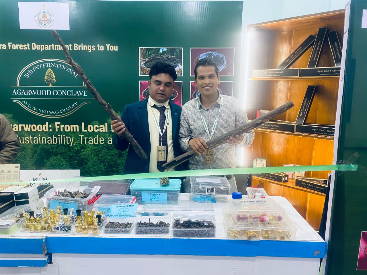 Farmer planting agarwood saplings